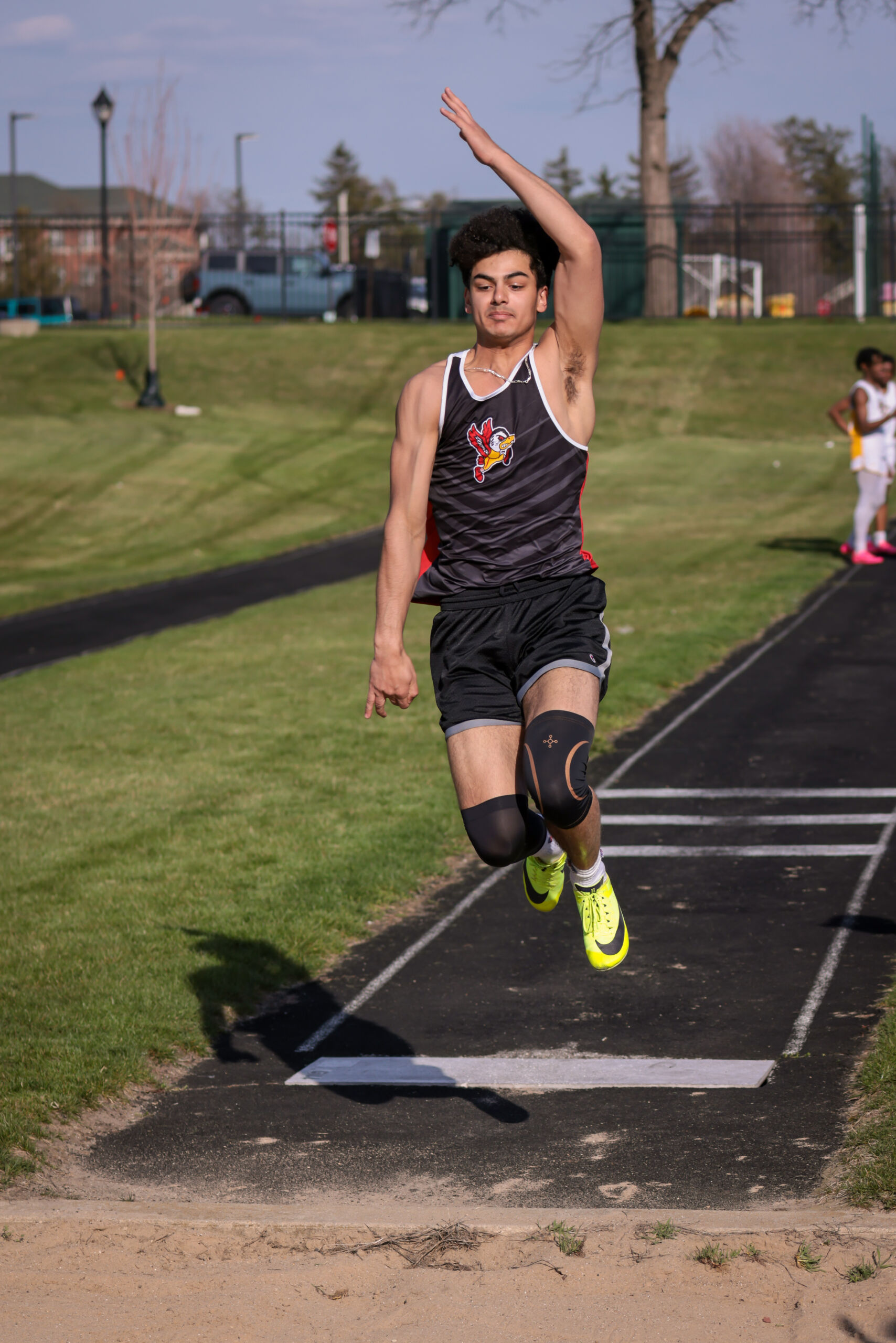 High school student playing track at Benet Stadium