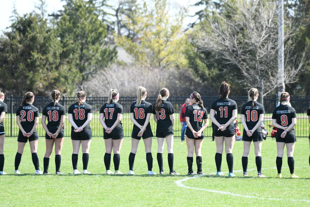 High school student playing soccer at Benet Stadium